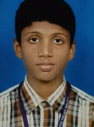 Srujan aged about fourteen